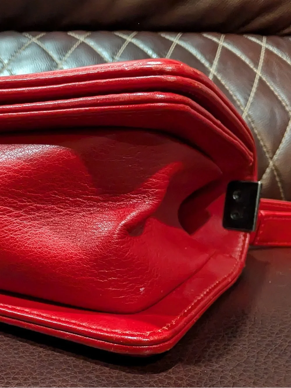 CHANEL Red leather small Boy with gunmetal tone chain